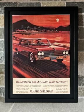 Framed 1963 Oldsmobile Rocket V-8 at Sunset Vintage Original Print Ad Wall Art